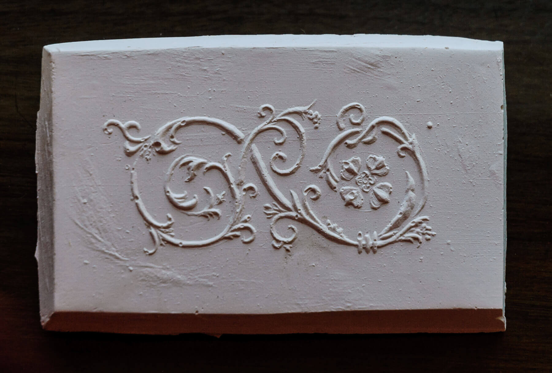 This is Ashton's plaster-positive made from his handmade motif for the face of the frame sides.