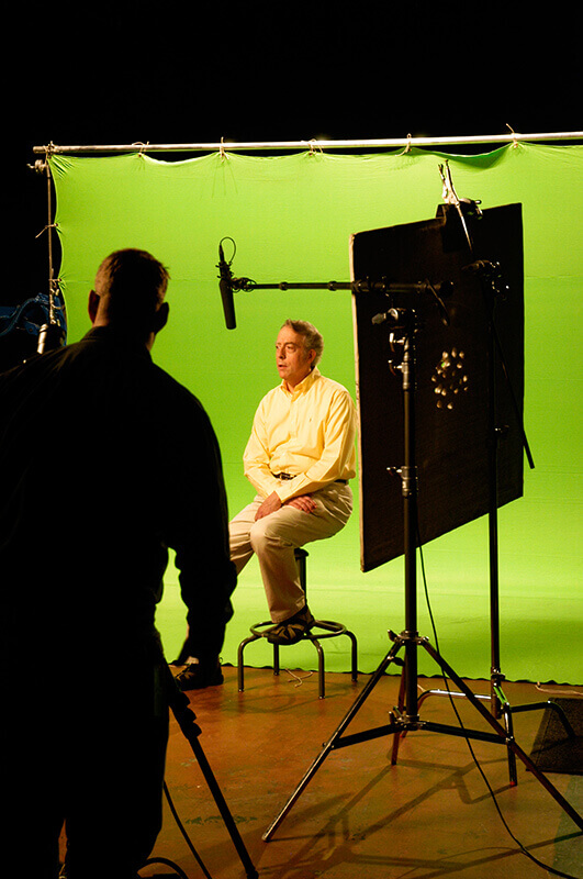 Behind the scenes shot of Al being interviewed for the video series