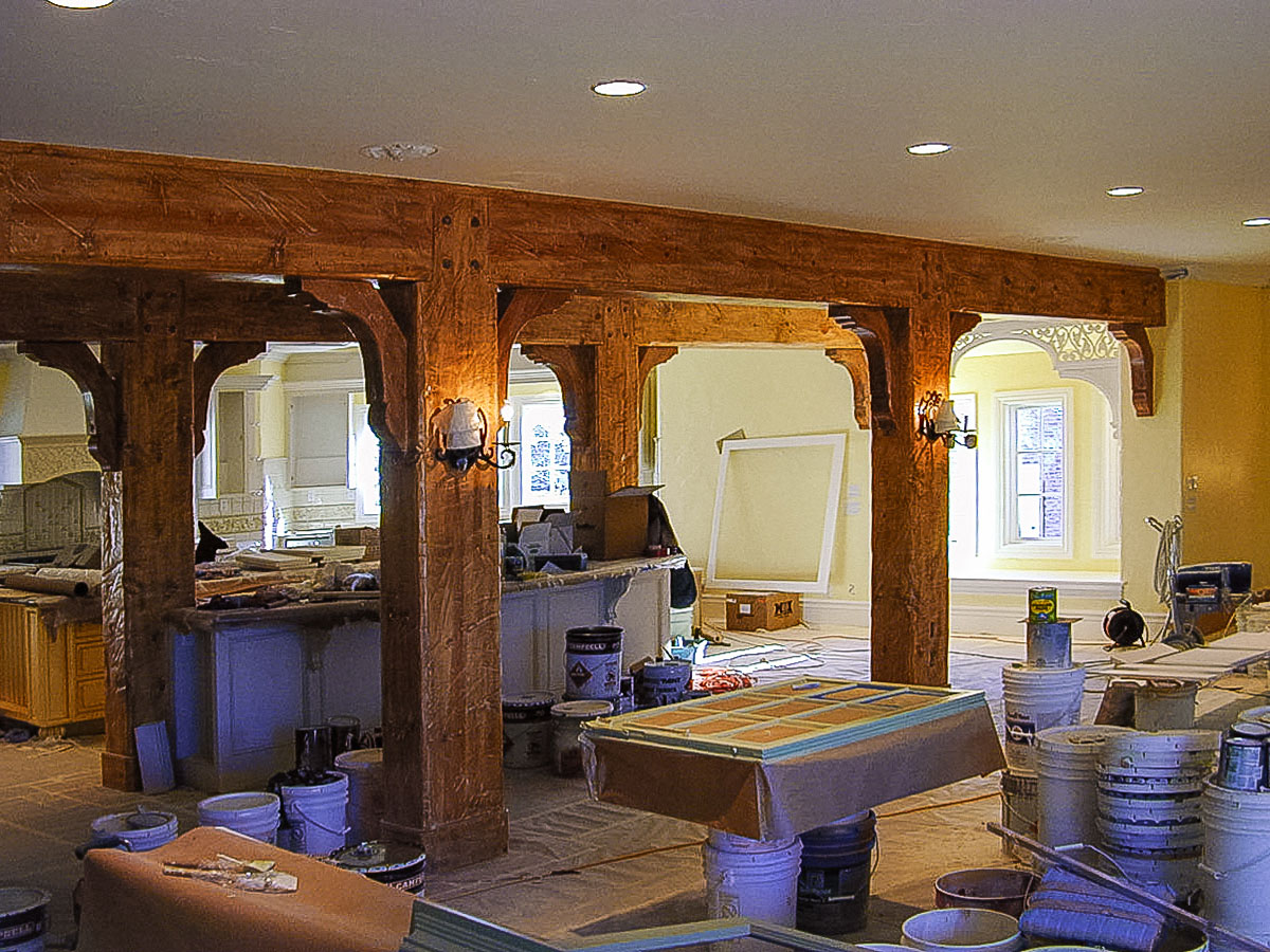 The appearance of hand-wrought woodwork is completed with stain and sealer.