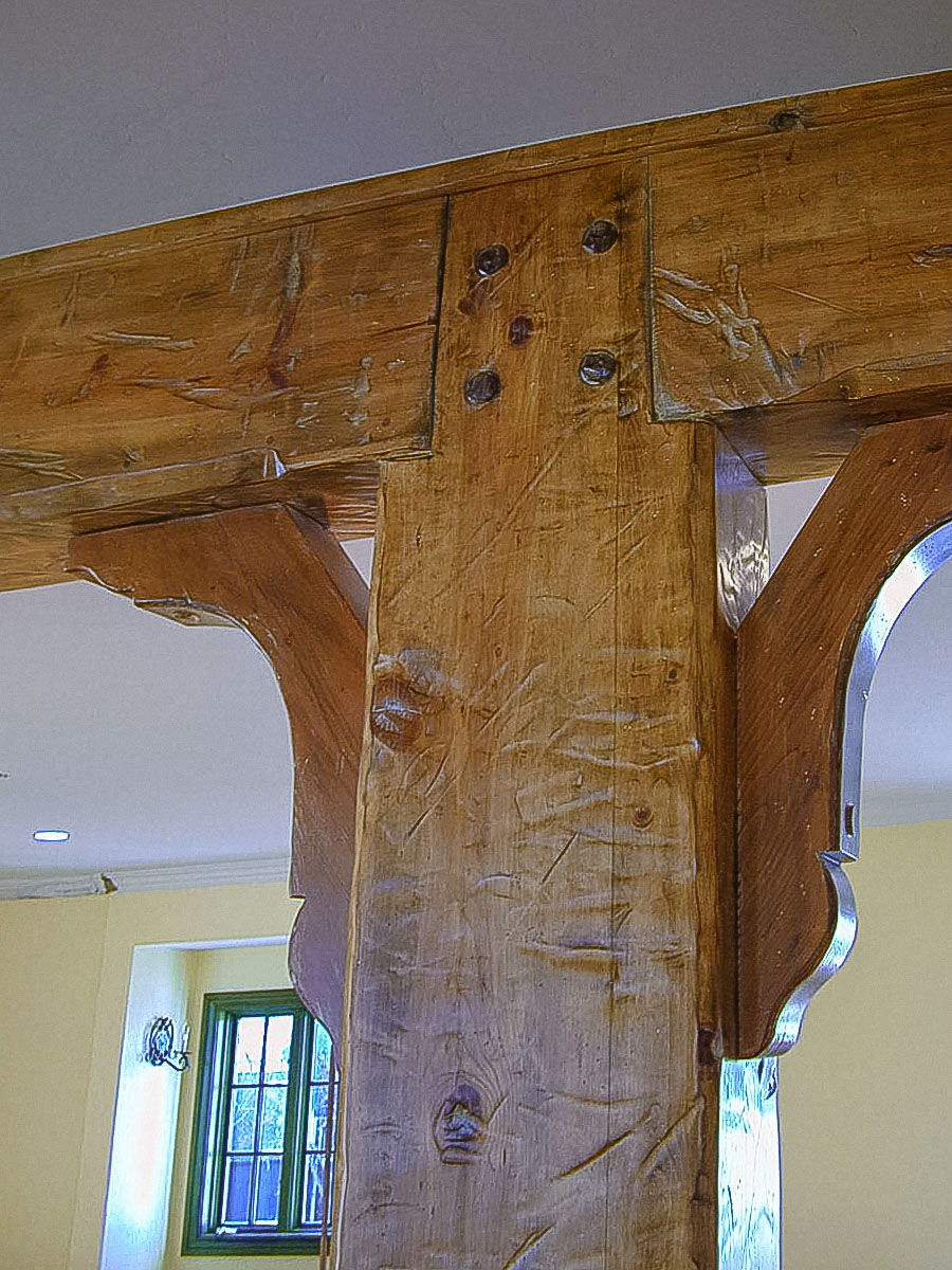 Detail of post and beam faux joinery.