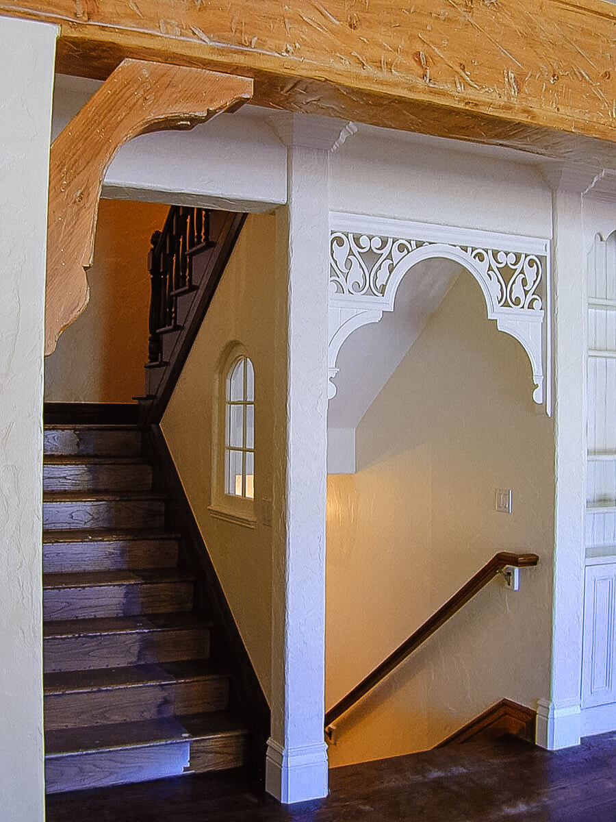 The completed tracery above the basement stairs.