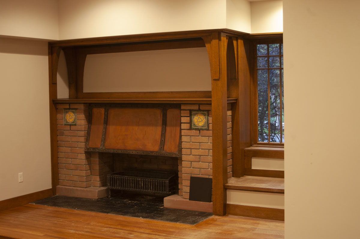 Ashton restored the mosaics and brick work in the facade of the main fireplace.  Read more...