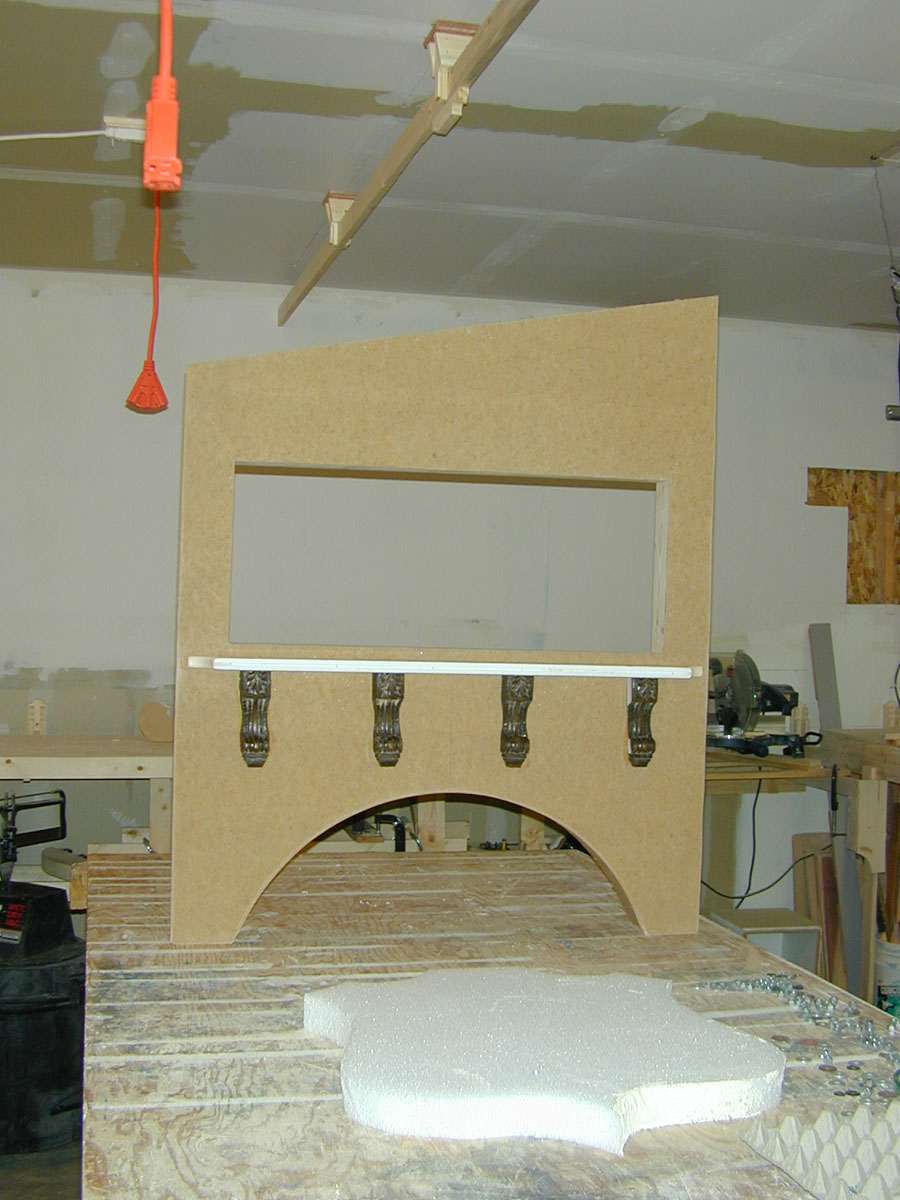 Al designed and built this part of the fireplace facade to cover an air intake vent required for the...