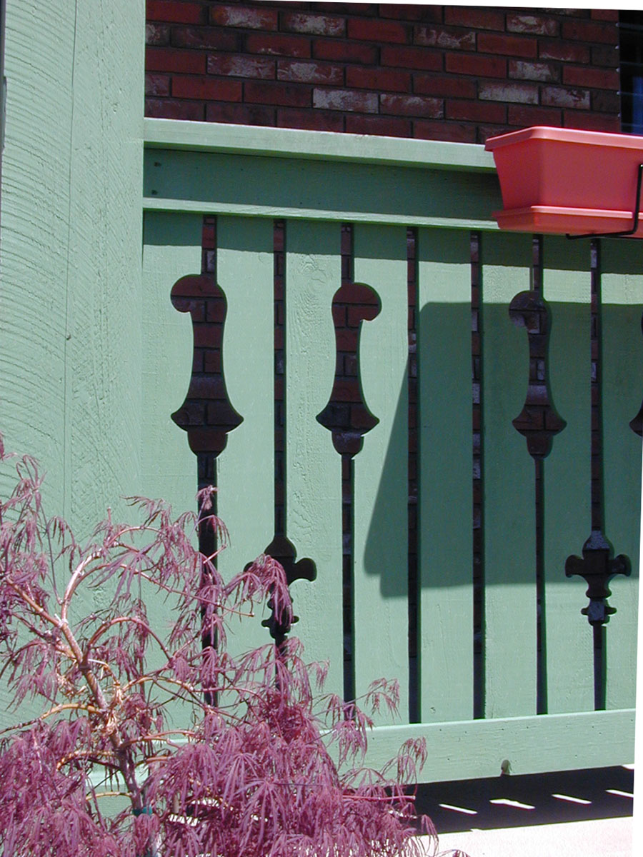 Porch slats designed and crafted to reflect the family's European heritage.