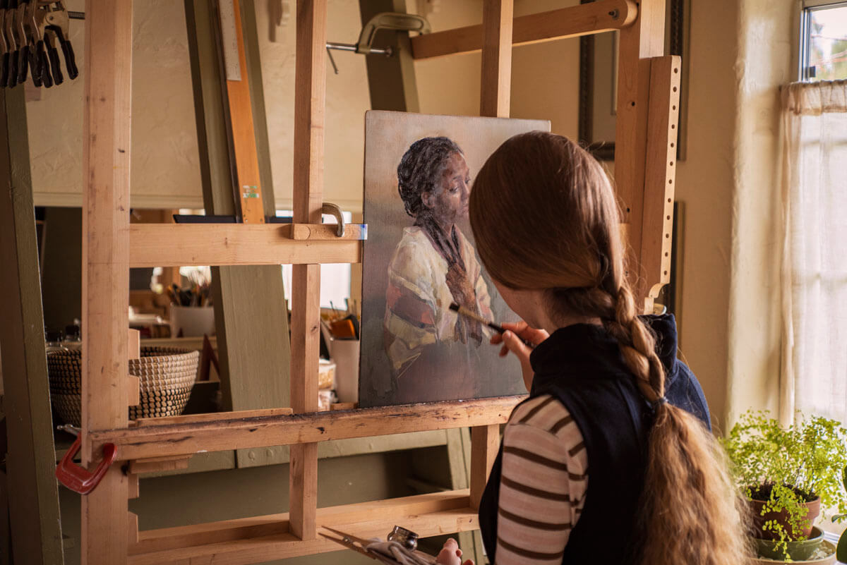 Elpseth working on the painting at the A-frame easel in her studio at Ben Haven.
