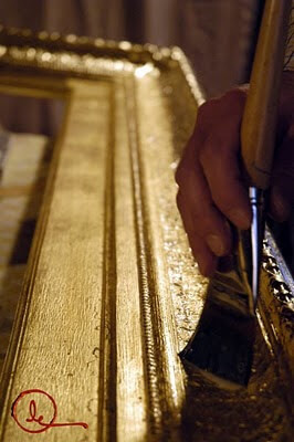 The gold leaf newly applied to the frame must be sealed preparatory to antiquing lest subsequent sta...