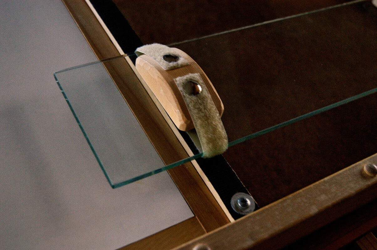 A quarter-inch thick length of glass spans the stone-cavity and serves as a bridge.&nbsp;&nbsp;Each ...