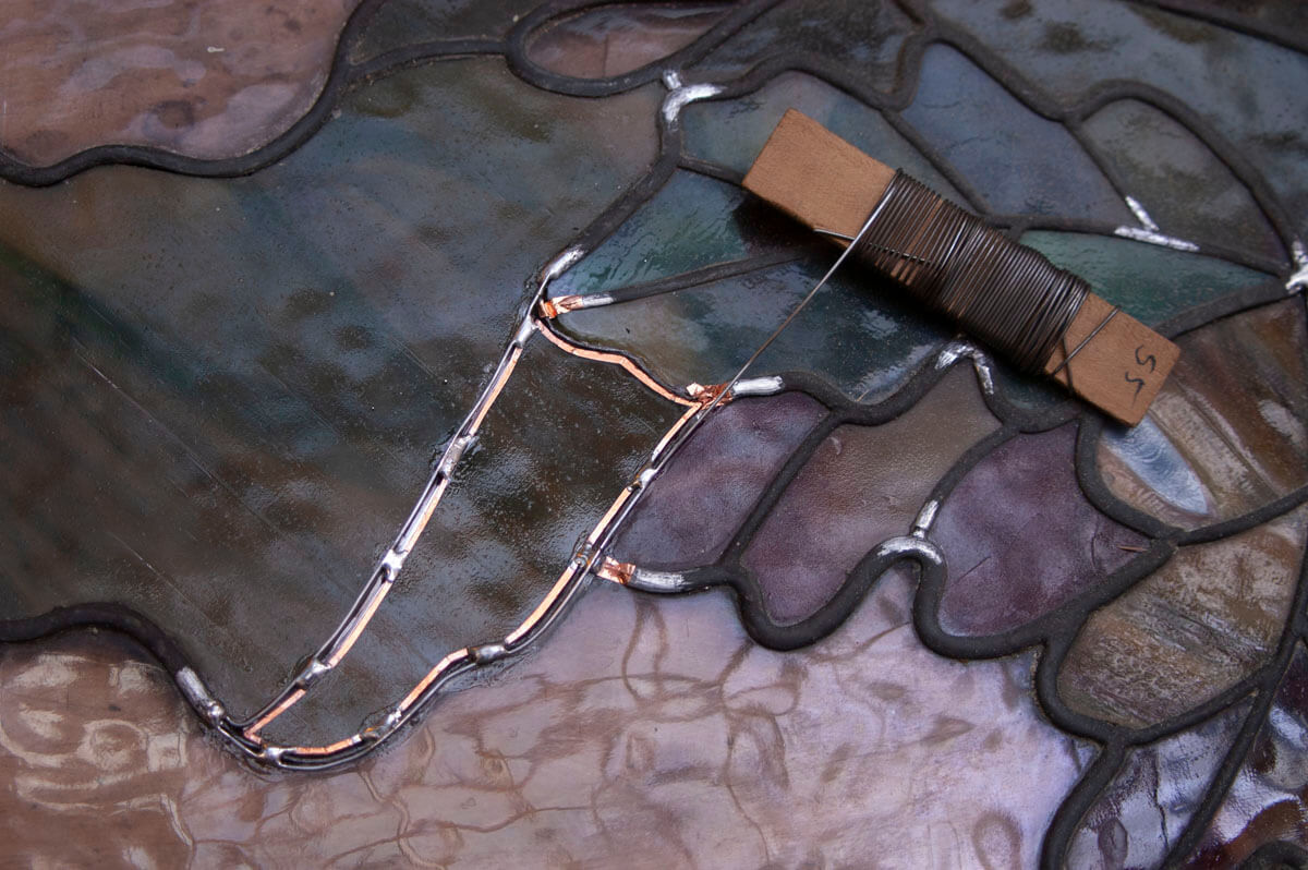 With a replacement piece of glass in place, this areas is ready for solder.&nbsp;&nbsp;Before insert...