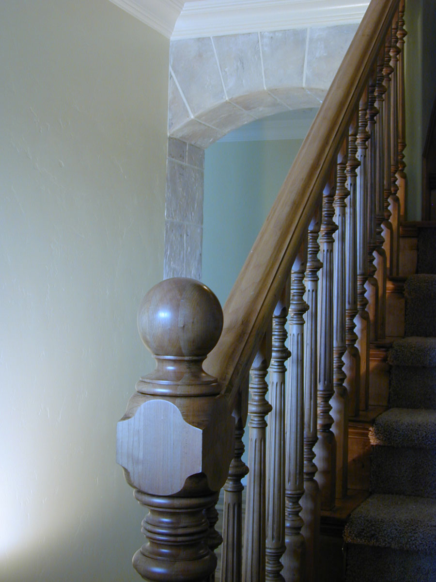 Another arch in the hall behind the fireplace.&nbsp;&nbsp;Seen from an entryway, the glimpse of ston...